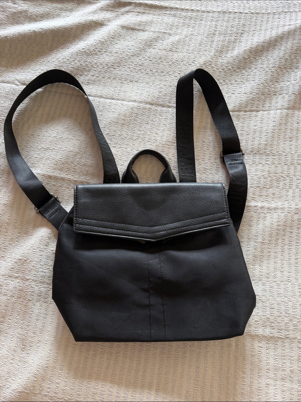 Botkier NY Black Faux Leather and Nylon Backpack with Flap and Front Zipper